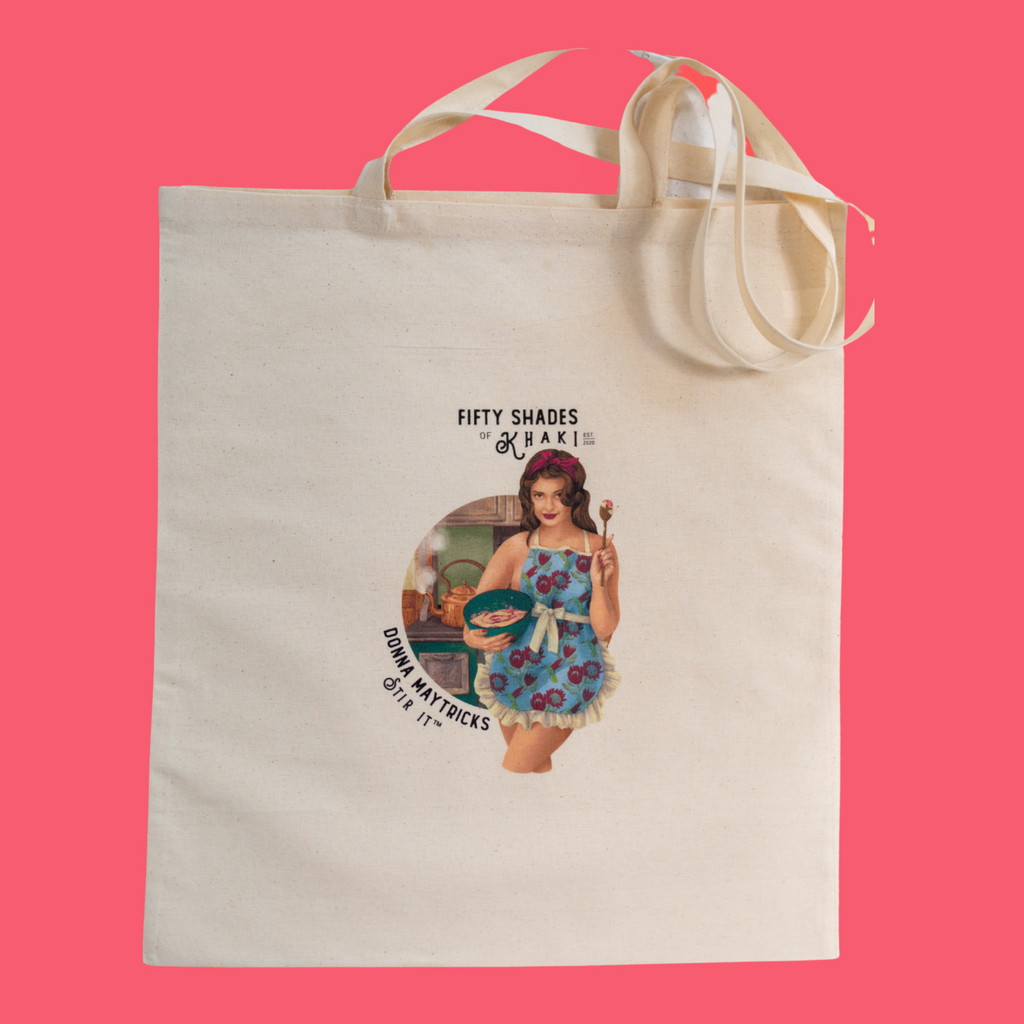 This tote bag is super beautiful with a unique vintage ‘Boere-Burlesque-flair’ and color print design. Treat yourself to a giggle! The slogan on the bag is Donna Maytricks - Stir It. Authentic South-African gift items are proudly brought to you by Fifty Shades of Khaki online store.