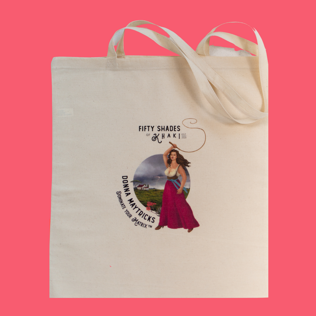 This tote bag is super beautiful with a unique vintage ‘Boere-Burlesque-flair’ and color print design. Treat yourself to a giggle! The slogan on the bag is Storm - Donna Maytricks Dominate your Matrix. Authentic South-African gift items are proudly brought to you by Fifty Shades of Khaki online store.