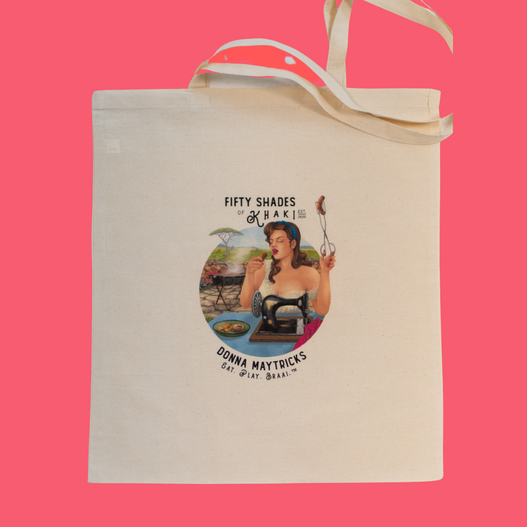 This tote bag is super beautiful with a unique vintage ‘Boere-Burlesque-flair’ and colored print design. Treat yourself to a giggle! The slogan on the bag is Donna Maytricks Eat, play, braai. Authentic South-African gift items are proudly brought to you by Fifty Shades of Khaki online store.