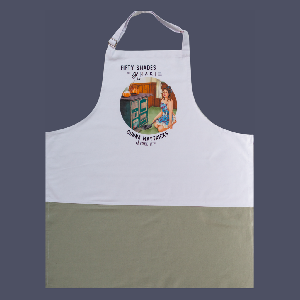 This quality apron is the perfect gift. The color print is beautifully designed and unique with a vintage ‘Boere-Burlesque-flair’. The product taglines are witty and on this apron it is Stoke it.. The one-size-fits-all apron panel is 70cm in width, has long tie-back bands to wrap around the skinny or full-bodied alike. 2-tone white and khaki chic and adjustable clasp for neck.