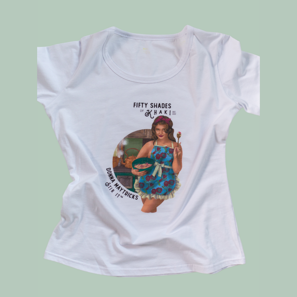 This is a super gorgeous ladies fitted T-Shirt. The illustration is stunning and unique with a beautiful vintage ‘Boere-Burlesque’ image and color print design. The taglines are witty and this one says Donna Maytrix - Stir it. White short sleeve T-shirt with a round neck.