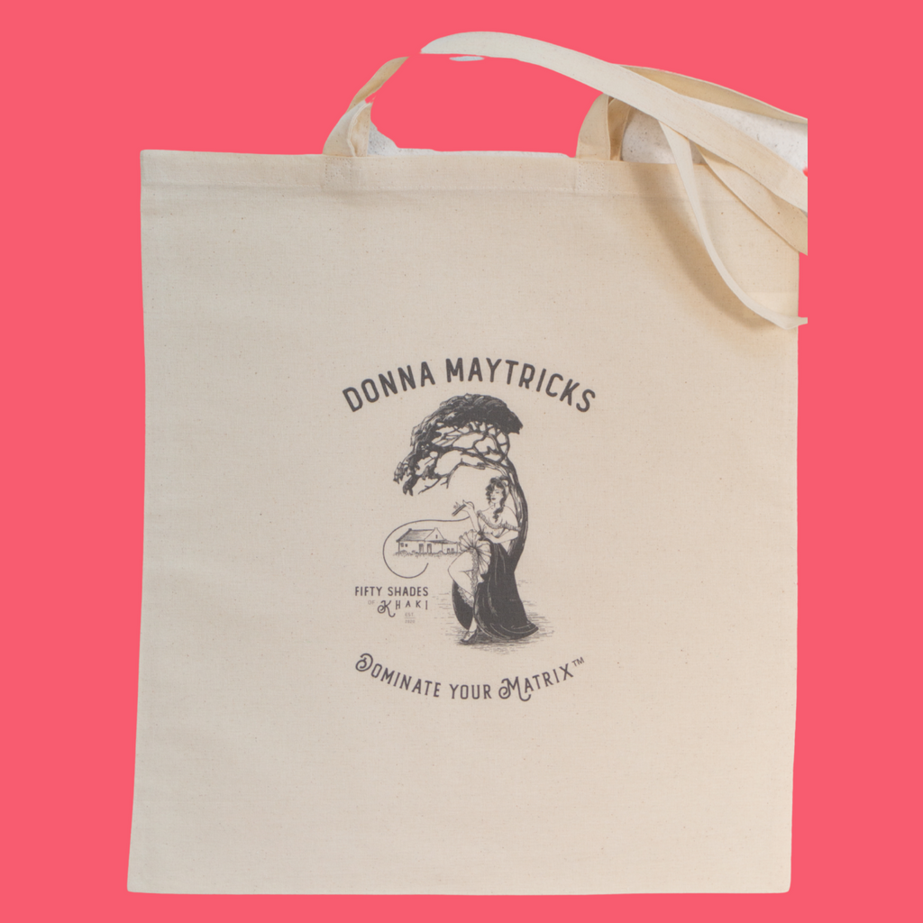 This tote bag is super beautiful with a unique vintage ‘Boere-Burlesque-flair’ and white and black print design. Treat yourself to a giggle! The slogan on the bag is Donna Maytricks Dominate your Matrix. Authentic South-African gift items are proudly brought to you by Fifty Shades of Khaki online store.
