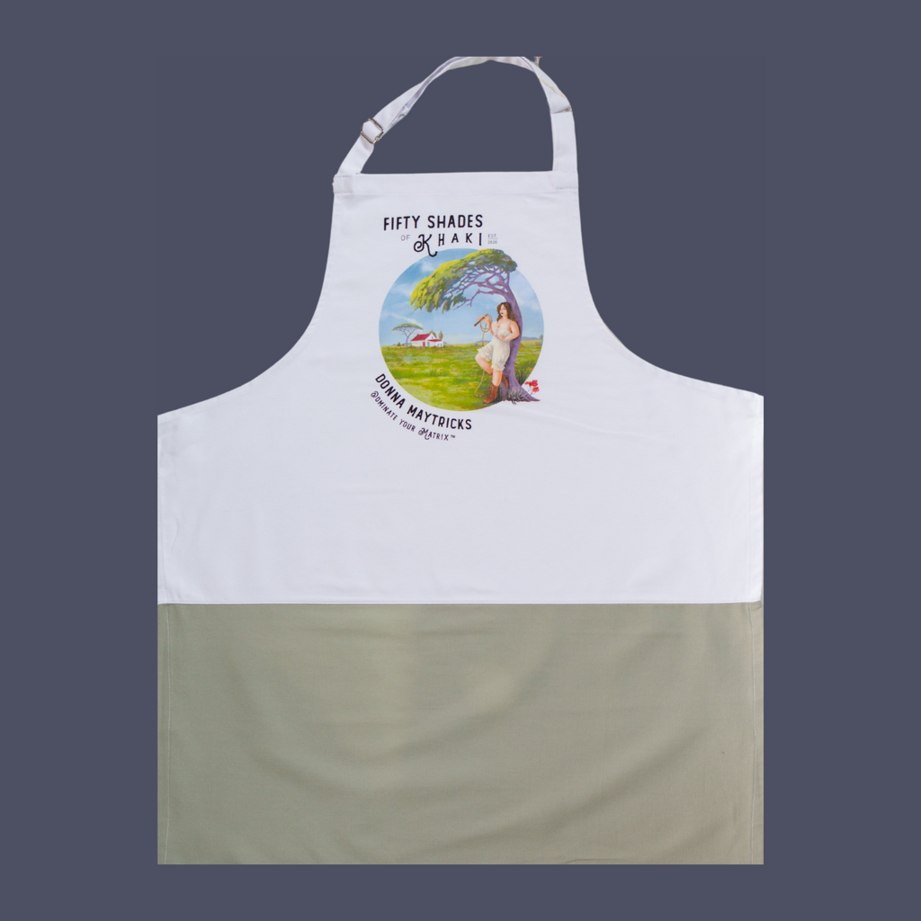 This quality apron is the perfect gift. The color print is beautifully designed and unique with a vintage ‘Boere-Burlesque-flair’. The product taglines are witty and on this apron it is Dominate Your Matrix. The one-size-fits-all apron panel is 70cm in width, has long tie-back bands to wrap around the skinny or full-bodied alike. 2-tone white and khaki chic and adjustable clasp for neck.